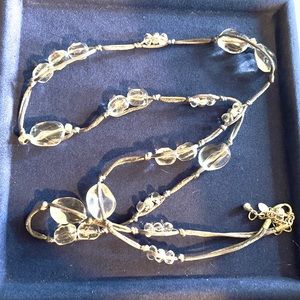 Long necklace in grey with clear beads